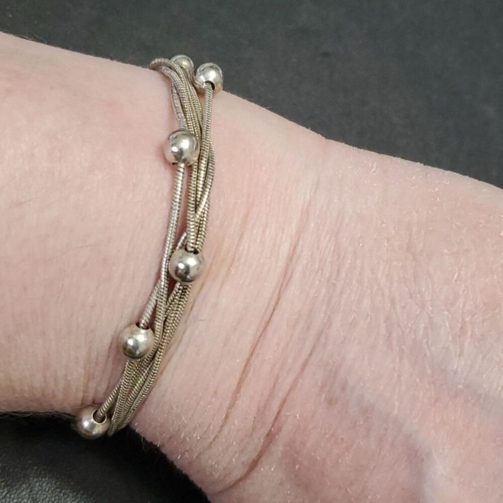 Silver tone multi strand bracelet 8"